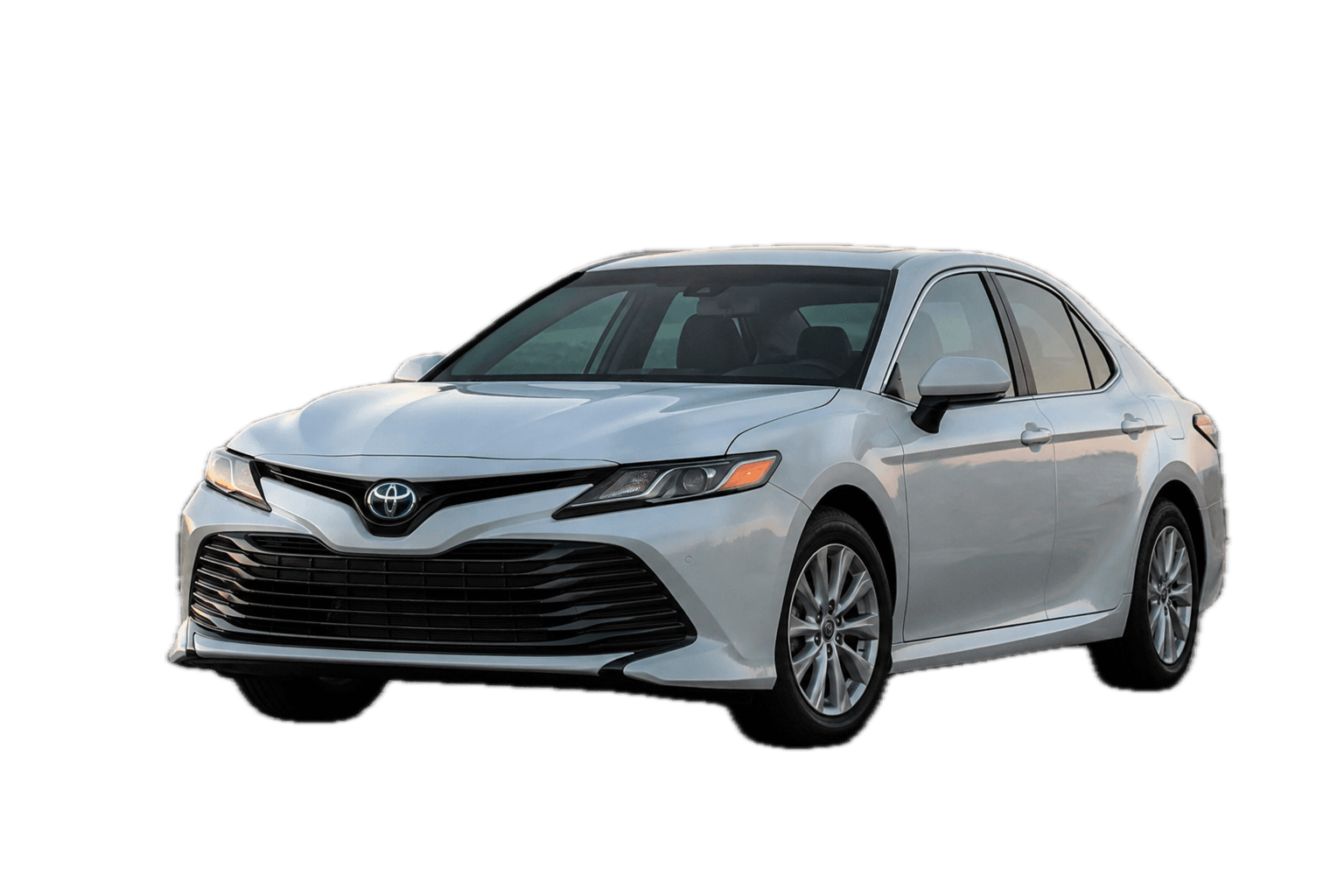 White Toyota Camry sedan, three-quarter front view, isolated on white